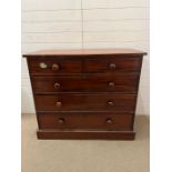 A mahogany two over three chest of drawers with knob handles AF (H104cm W120cm D54cm)