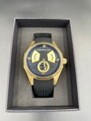 Morphic M34 quartz watch, black/gold dial, gold case and bezel, black silicon textured strap.