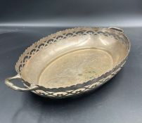A silver pierced bowl, hallmarked for London 1932 by C J Vander Ltd (462g approximate total weight)
