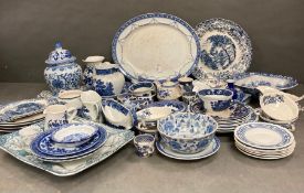 A large collection of blue and white china, various makers and ages, to include meat platter,