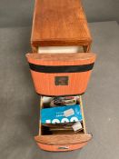 Three wooden boxes of loose stamps
