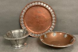 Three items of Art Nouveau metal ware to include a copper charger and bowl along with a pewter