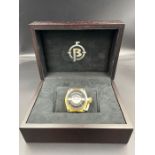 Ballast quartz gold pla ted case, black bezel, gold and mop dial, canteen crown cover, black
