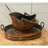 A large twin handle copper pan and coal scuttle (H10cm W49cm D32cm)