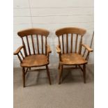 A pair of Windsor pine chairs