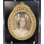 An 18th Century miniature of a lady with ringlets (15 cm x 12.5 cm)