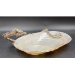 A Mother of Pearl bowl with serpent handle