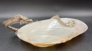 A Mother of Pearl bowl with serpent handle