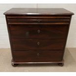 A mahogany bachelors chest of drawers on bun feet (H93cm W92cm D35cm)