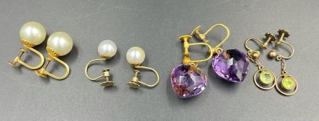 Four pairs of 9ct gold set earrings