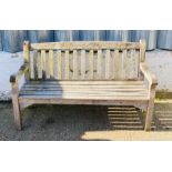 A wooden garden bench (H90cm W150cm D55cm)