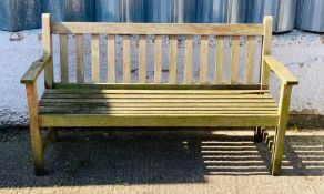A wooden garden bench (H87cm W152cm D51cm)