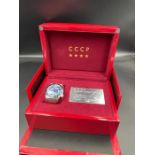 CCCP Aurora automatic blue light watch: blue dial, black bezel ss case ss seven link bracelet.