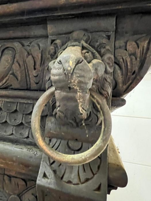 A Gothic inspired glazed bookcase cabinet with carved lion heads to each corner with brass rings and - Image 6 of 10