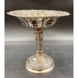 A German silver centre piece with a pierced top with farming themed decoration (15cm H and 15.5 cm