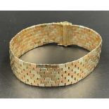 A 9ct two coloured gold bracelet (Approximate Weight 42g)