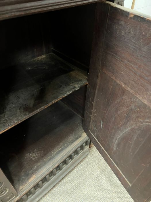 A Gothic inspired glazed bookcase cabinet with carved lion heads to each corner with brass rings and - Image 4 of 10