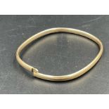 A 9ct gold bangle (Approximate total weight 4.8g)