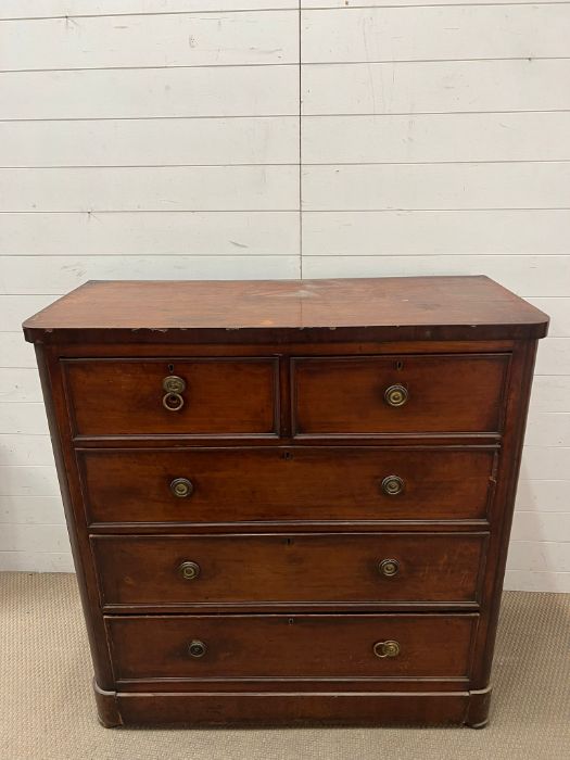 A mahogany two over three chest of drawers with brass ring handles (H120cm W114cm D50cm) - Image 3 of 3