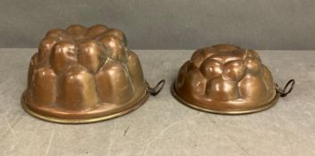 Two brass jelly moulds