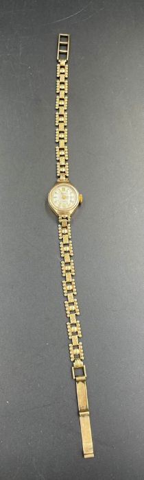 A ladies gold Regency 17 jewels watch on a 9ct gold bracelet. (Approximate Total Weight 10.6g)