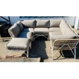 An off white woven garden corner suite with cushions by Lucy Collection (242cm x 248cm)