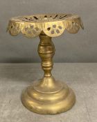 A Victorian brass trivet pot stand