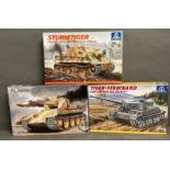 Two Italeri models, a sturmitgen tank and a Tiger Ferdinai and a Gunze Sangyo Flanker V Coelian