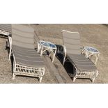 Two off white woven garden sun loungers and two side table by Lucy Collection