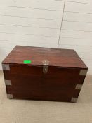 A planked chest with iron metal work to sides (H59cm W97cm D58cm)