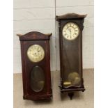 Two wall hanging clocks AF