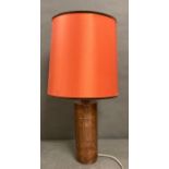 A table lamp with a copper base