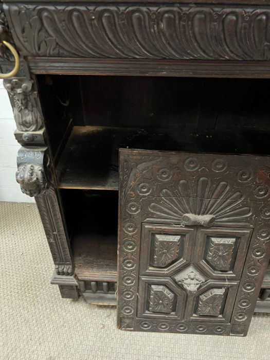 A Gothic inspired glazed bookcase cabinet with carved lion heads to each corner with brass rings and - Image 5 of 10