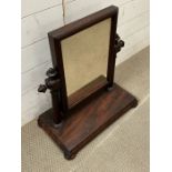 A mahogany dressing table mirror