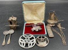 A selection of silver jewellery and curiosities