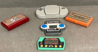 A selection of Vintage handheld computer games including a Nintendo Game & Watch Donkey Kong and a