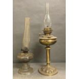 A pair of vintage oil lamps