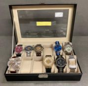 A selection of nine watches in a a watch box, various makers and styles to include Shenhua, MG,