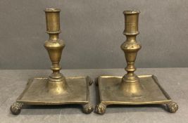 A pair of brass Victorian, Queen Anne style candle sticks