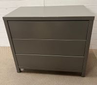 A Contemporary three drawer Chest Of Drawers in grey. 100cm x 56 cm x 90 cm