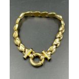 An 18ct gold bracelet, marked 750, (Total approximate weight 20g)