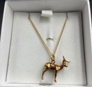 A 9ct gold chain and deer pendant (Approximate Total Weight 4.7g)