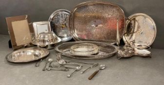 A selection of silver plated items to include trays, photo frames etc.