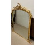 A Rococo style carved giltwood over mantle mirror, arched cartouche shaped design (H151cm W123cm)