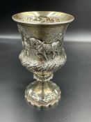 A silver goblet, hallmarked for 1860. The Manor's Cup Burnley 1863, decoarted with a country scene