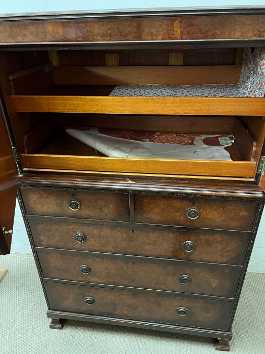 A linen press with panelled doors opening up to shelves with a chest of drawers under (H152cm - Image 6 of 9