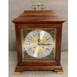 An Eight day mantel clock in mahogany case