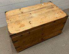 A pine blanket box with brass mounts (H47cm W85cm D48cm)