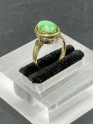 A 14ct gold and jade ring (Total approximate weight 3.5g)