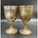 Two silver cups by Harris Brothers, hallmarked for 1897 and 1900, engraved to base (Approximate